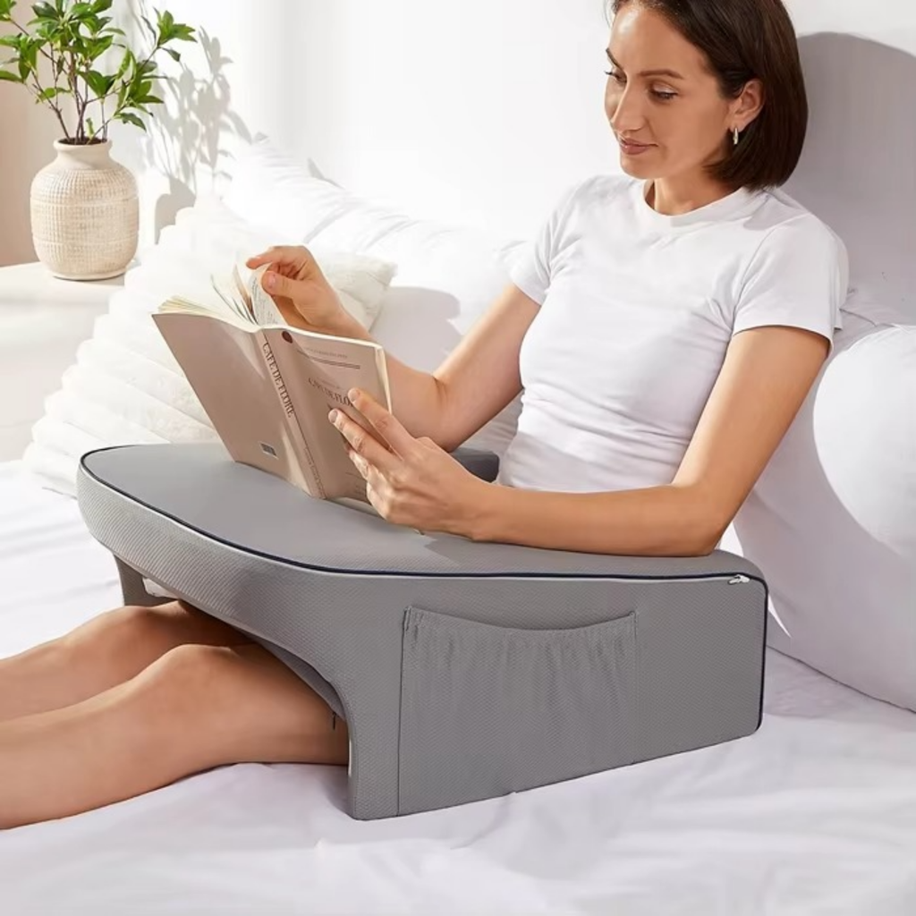 Ergonomic lap pillow for comfort while sitting