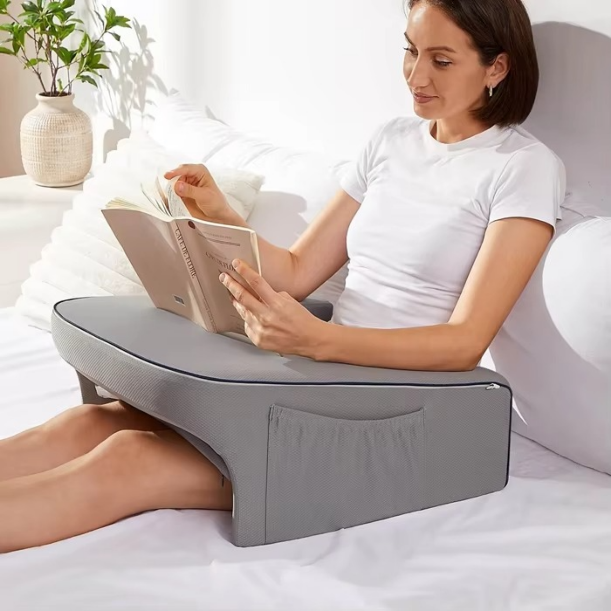 Ergonomic lap pillow for comfort while sitting