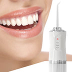 Electric dental oral irrigator for gum and teeth cleaning